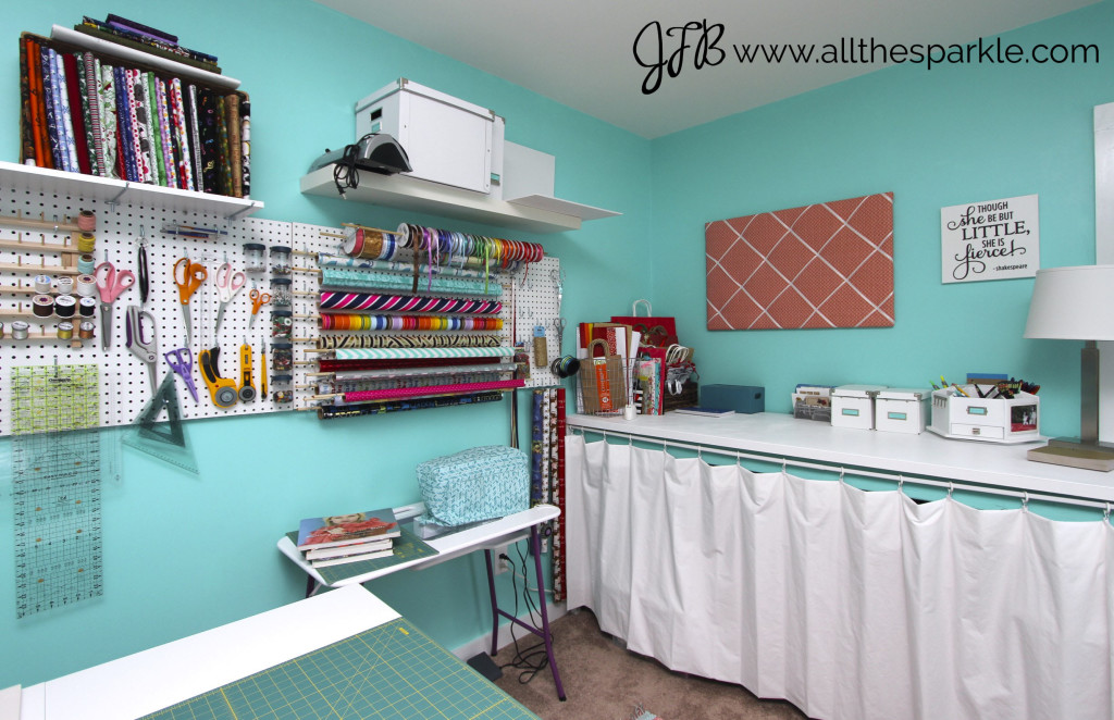 Teal, coral, and white craft room www.allthesparkle.com